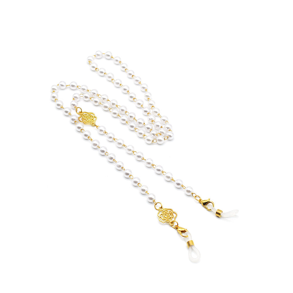 Elegante Brillekette mit Perlen und Goldakzenten Brehn