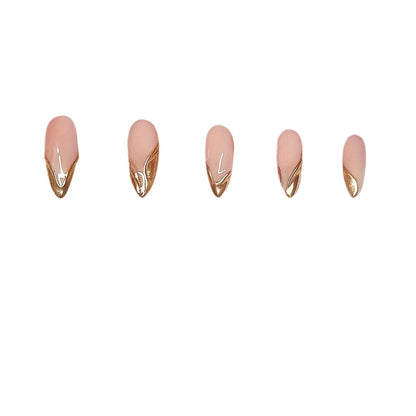Elegante Stiletto Press-On Nägel mit goldenen Akzentspitzen Brehn