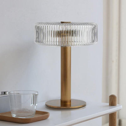 Elegante gerippte Glas- und Goldtischlampe