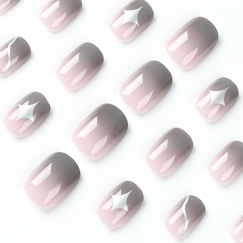 Künstliche Nagelkunst mit elegantem Ombre-Design und reizvollen Akzenten Brehn
