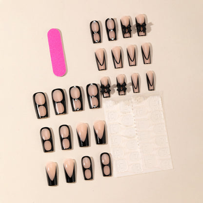 Elegante Stiletto-Nagelkunstverlängerungen mit Schleifenakzenten Brehn