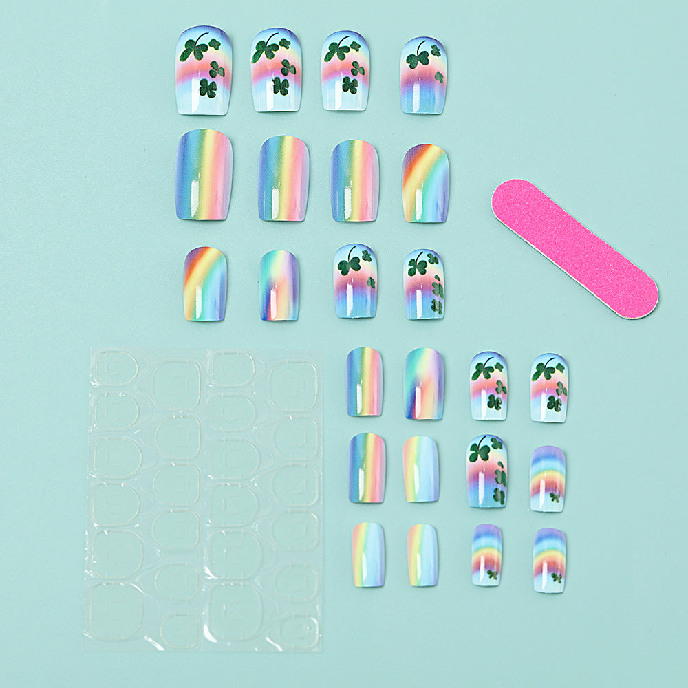 Kunstnägel mit bunten Regenbogen- und Kleeblatt-Designs Brehn