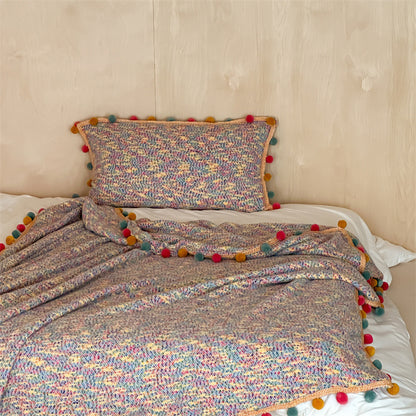 Extraweiche Kuschel-Wohndecke mit Pompon-Borte und meliertem Chenille-Relief Brehn
