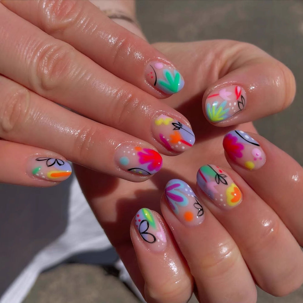 Kreatives Nagelkunstset mit bunten Blumen-Designs Brehn