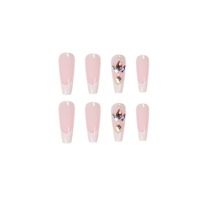Premium Nagelverlängerungen mit eleganten Designs und Glitzerakzenten Brehn