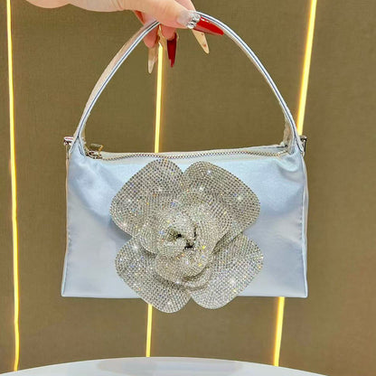 Blumenverzierter Handtasche