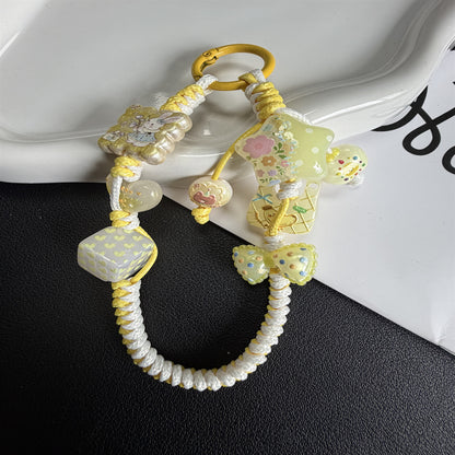 Verspielte Perlencharme-Handyband Brehn 1790134944