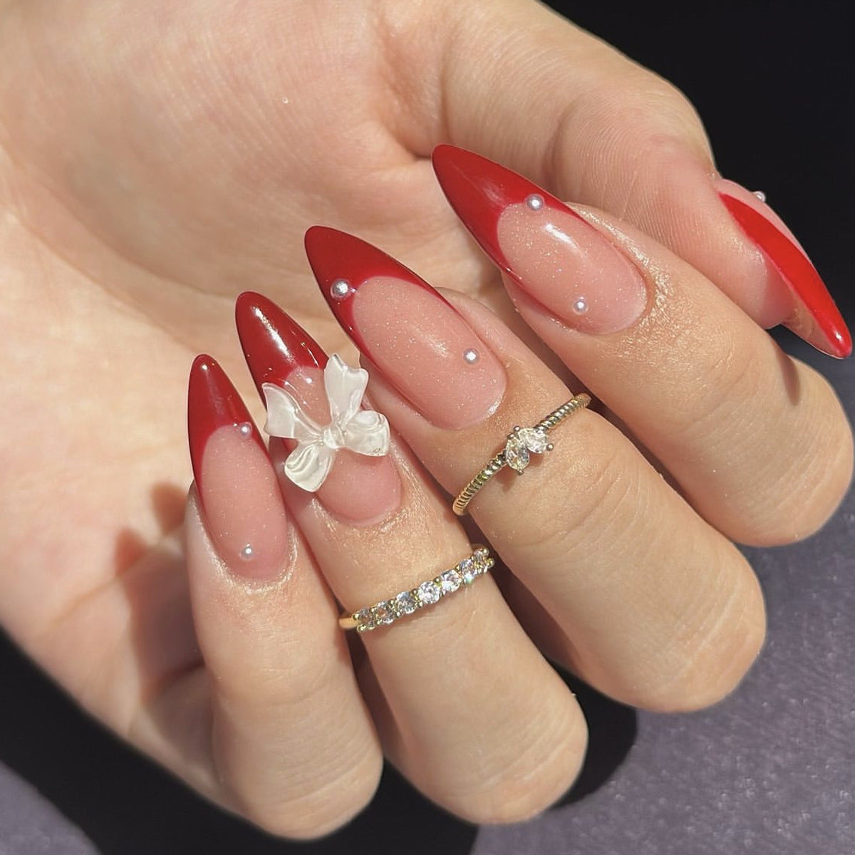 Elegante Stiletto-Nagelkunstverlängerungen mit 3D-Schmetterlingsakzenten Brehn