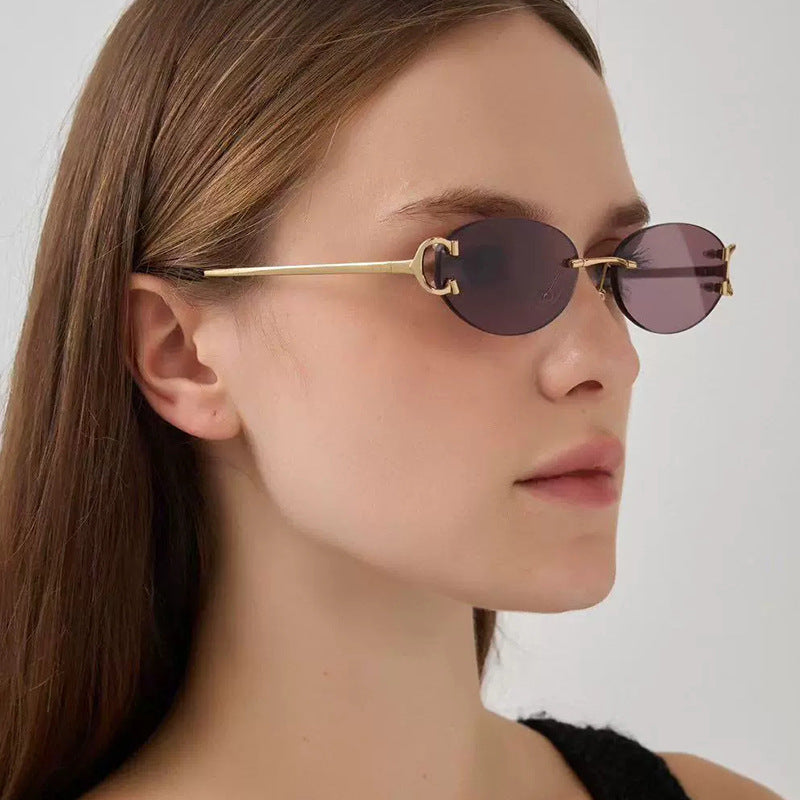 Damen elegante ovalförmige Sonnenbrille mit modischem Metallrahmen Brehn