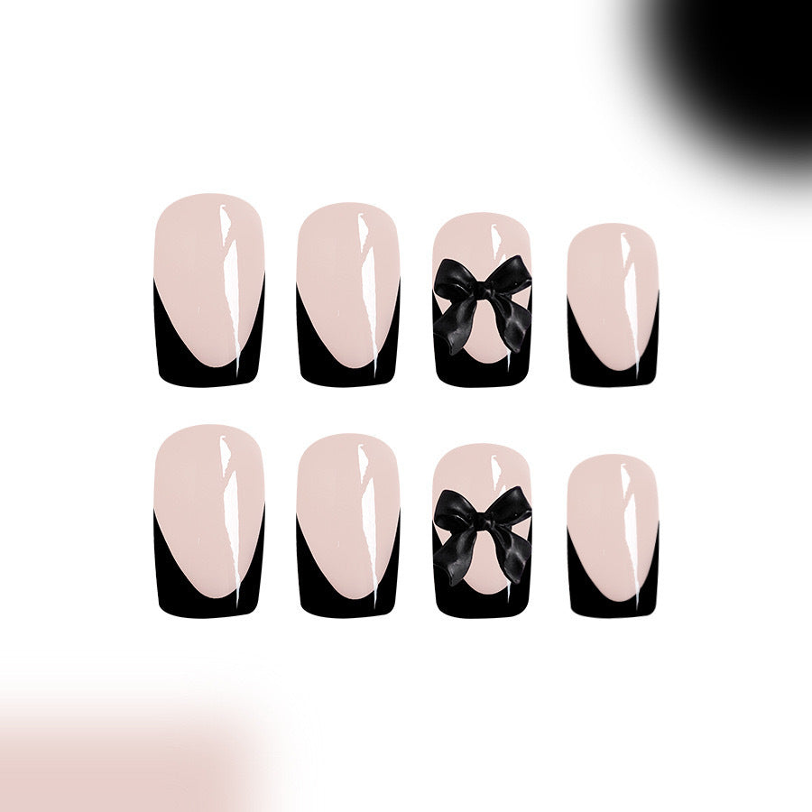 Kunstnagelset mit glamourösen Schleifenverzierungen Brehn