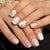 Elegantes Floral Design Gel Nail Art Brehn