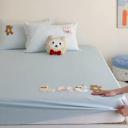 Besticktes Stretch-Spannbettlaken-Set mit Applikationsente und passenden Kissen