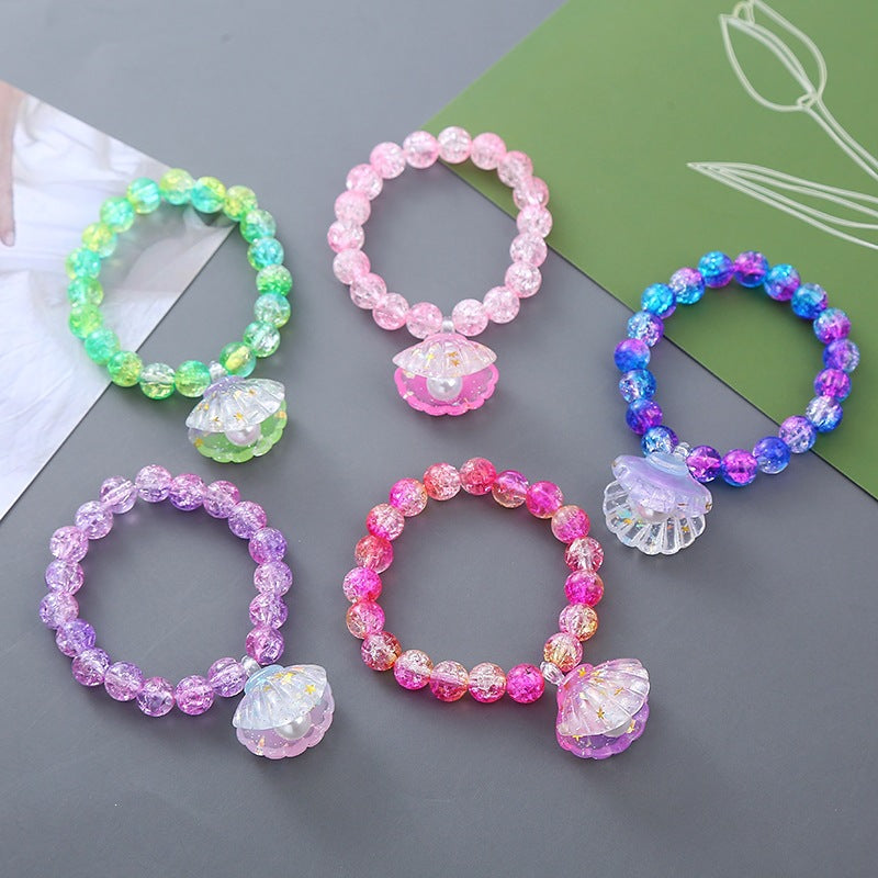 Verspieltes Armband mit Muschel-Anhänger Brehn