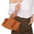 Damen Handtasche aus geflochtenem Naturmaterial mit Fransen und stylishem Henkel Brehn