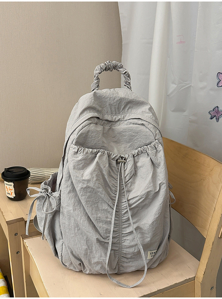 Lässiger zerknitterter Stoff-Schulrucksack