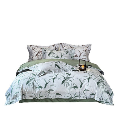 Bettwäsche-Garnitur aus Baumwollsatin mit botanischem Bambusblatt-Print und wendbaren Kissenbezügen