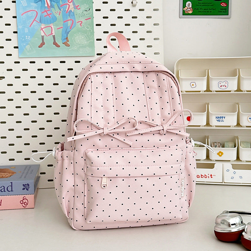 Süßer gepunkteter Studentenschulrucksack