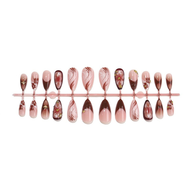 Kunstnagelset mit eleganten 3D-Blütenakzenten und glamourösen Designs Brehn