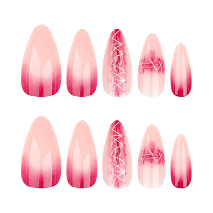 Kunstvolle Nagelverlängerungen im eleganten Ombre-Stil mit Kunstmotiv Brehn