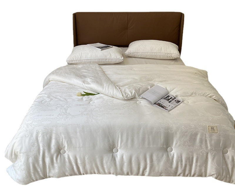 Extraleichte Satin-Jacquard-Steppdecke mit dezenter Knopfsteppung