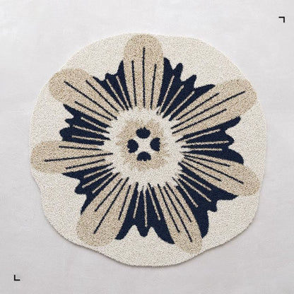 Blumenförmiger Teppich 1789754099