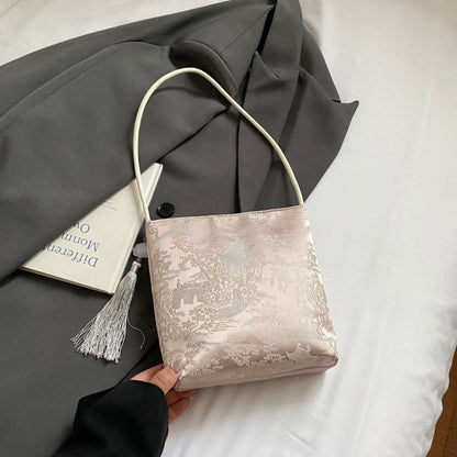 Elegante floral bedruckte Handtasche