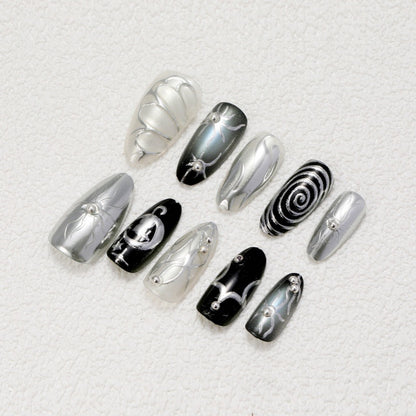 Kunstnägel mit Metallic-Effekten und komplexen Designs Brehn