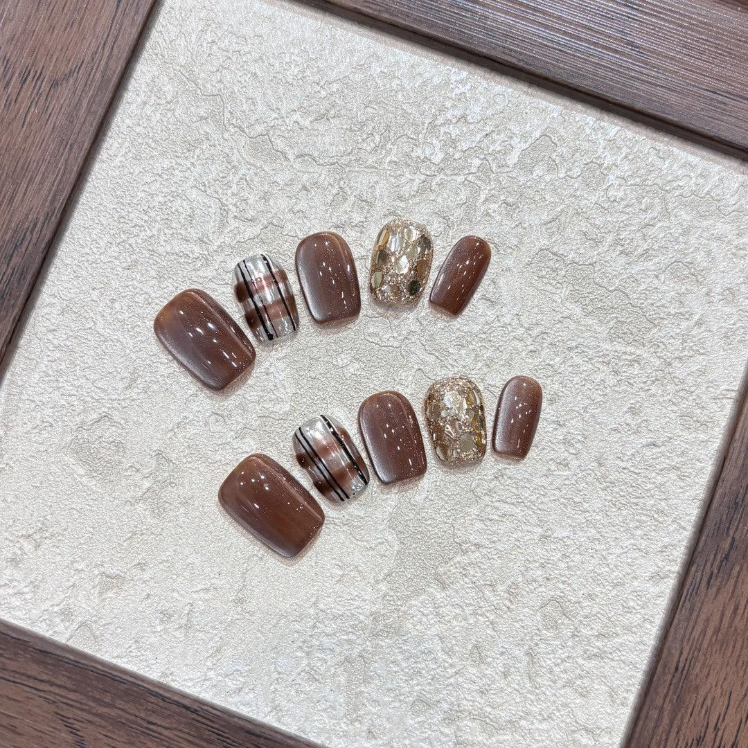 Kunstnägel-Set mit Glitzer- und Goldakzenten Brehn
