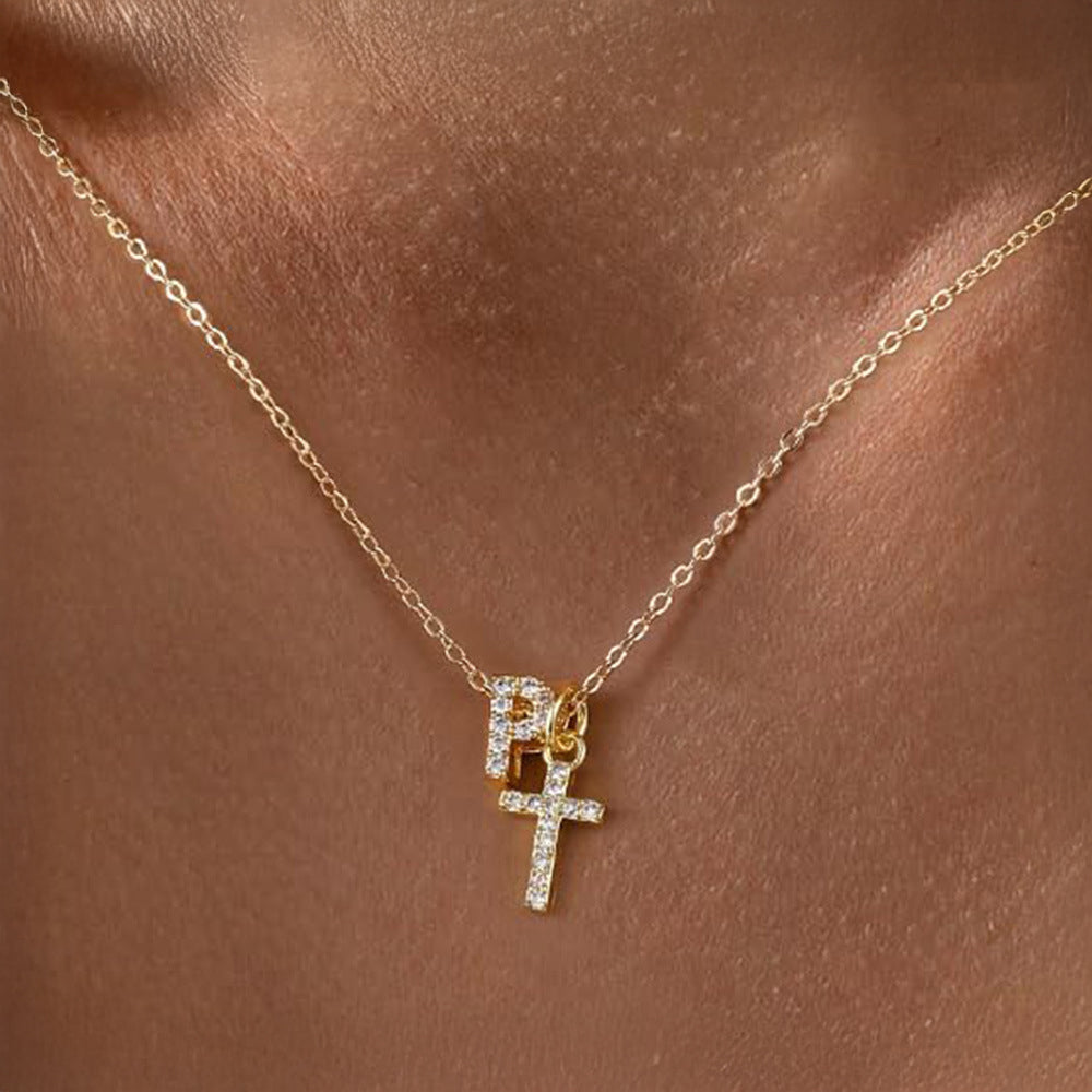 Brehn | Zarte Diamant Initial & Kreuz Halskette
