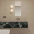 GlasAura Wandlampe mit Mattglasball und Metallbasis | Brehn