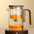 Teekanne aus Glas mit Holzgriff – Filter mit einem Klick | Ideal für loses Tee und Pu-Erh-Tee