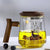 Premium Glas Teetasse mit Filter und Holzgriff, 470ml