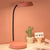Nordische minimalistische runde LED-Touch-Schreibtischlampe mit Augenschutz und USB-Anschluss