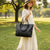Elegante Schultertasche aus Leder im Retro-Stil mit glatter Oberfläche