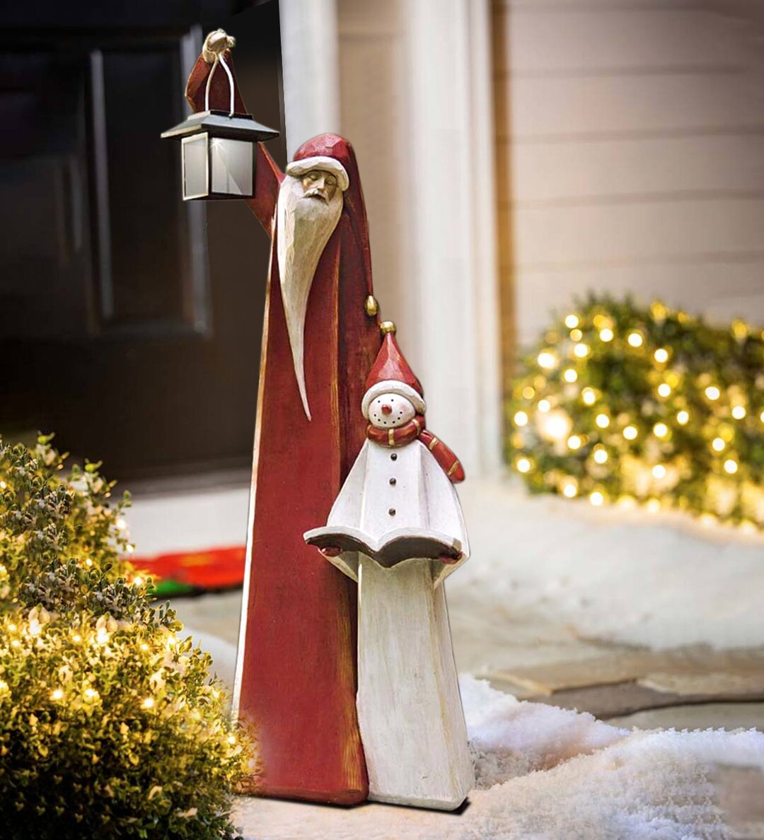 Weihnachtsmann- und Schneemann-Skulptur