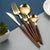 Elegantes Holzhantel Goldbesteckset für anspruchsvolles Essen
