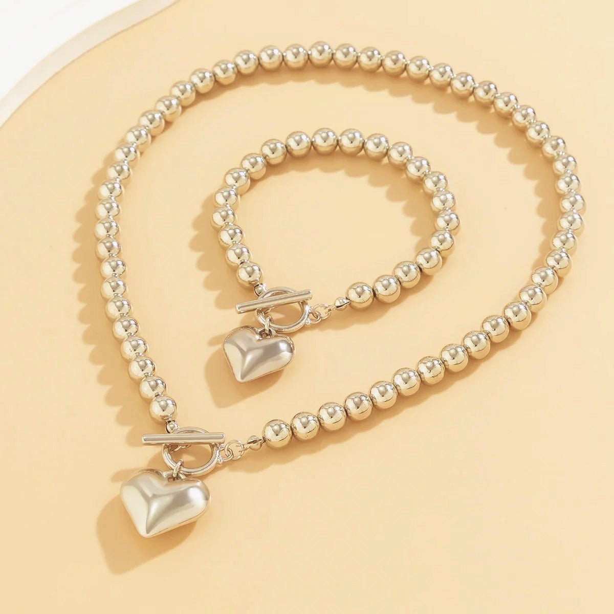 Brehn | 2er Set Perlen-Herz-Anhänger-Armband und Halskette