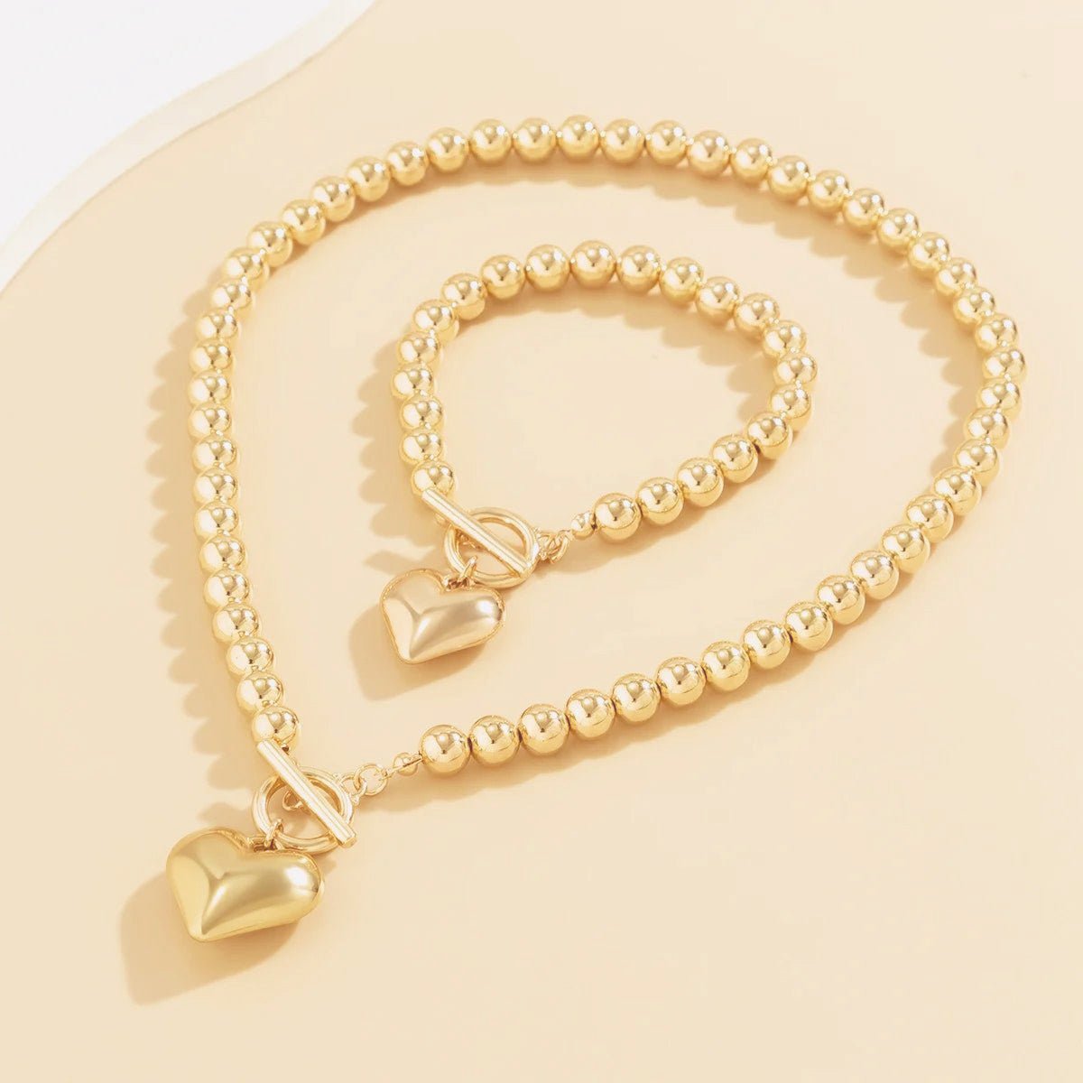 Brehn | 2er Set Perlen-Herz-Anhänger-Armband und Halskette