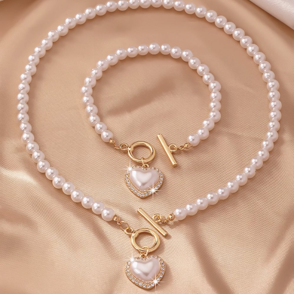 Brehn | 2er Set Perlen-Herz-Anhänger-Armband und Halskette
