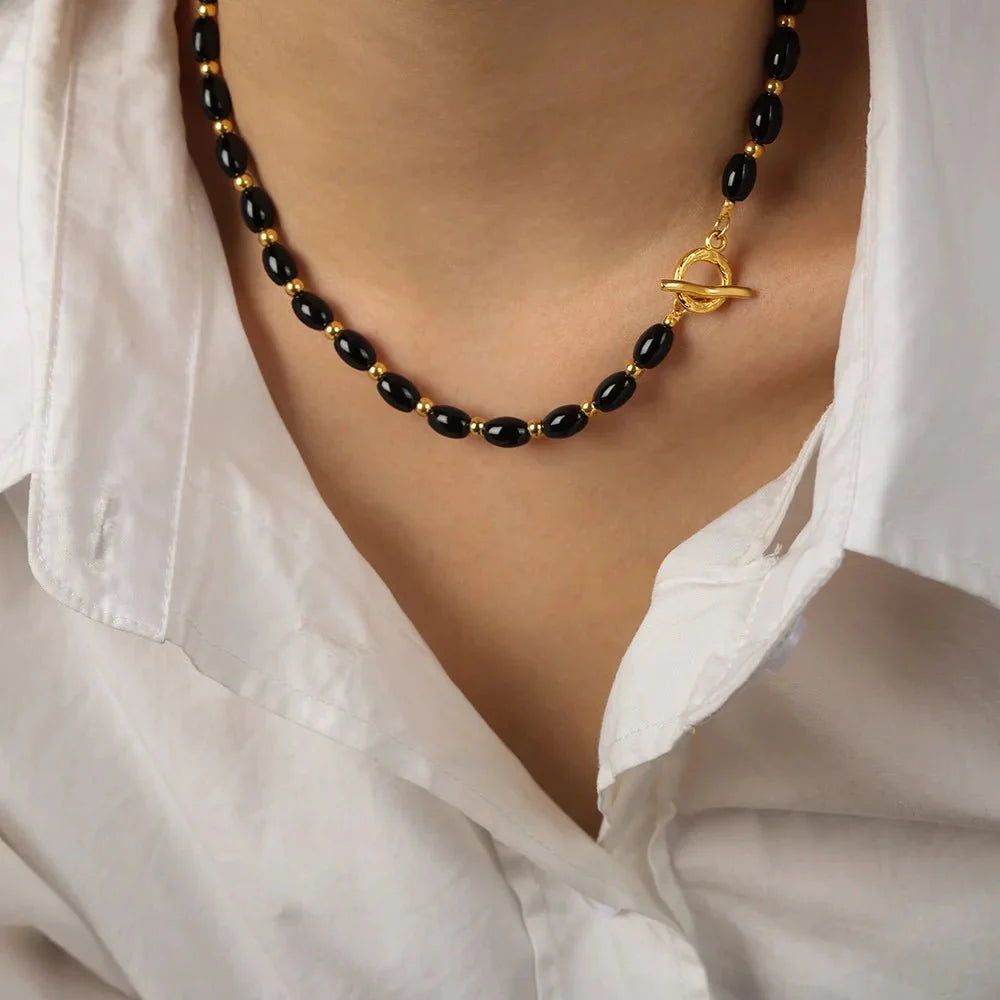 Brehn | Boho Perlen Schwarz und Gold Kreisverschluss Halskette