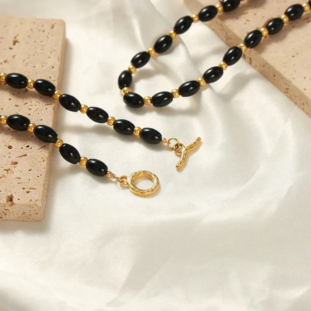 Brehn | Boho Perlen Schwarz und Gold Kreisverschluss Halskette