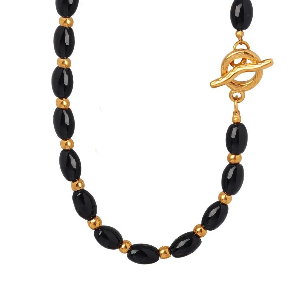 Brehn | Boho Perlen Schwarz und Gold Kreisverschluss Halskette