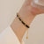 Brehn | Geflochtenes Gold- und Schwarzes Ketten-Lederarmband