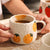 Keramiktasse mit verspieltem Obstdesign | Brehn