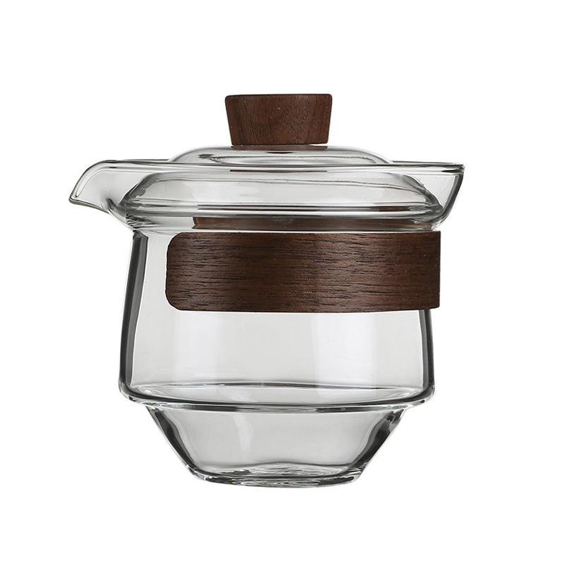 Elegante hitzebeständige Glastasse mit Walnussdeckel für Teeliebhaber