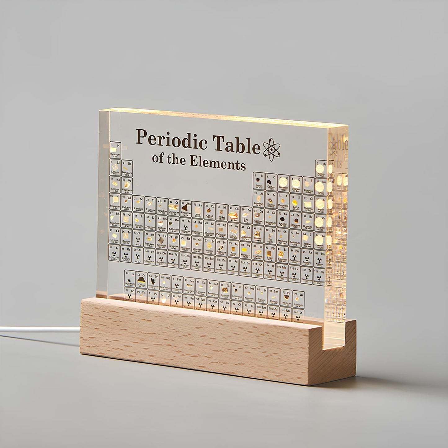Beleuchtete periodische Tabelle mit echten Elementen - Elementa | Brehn