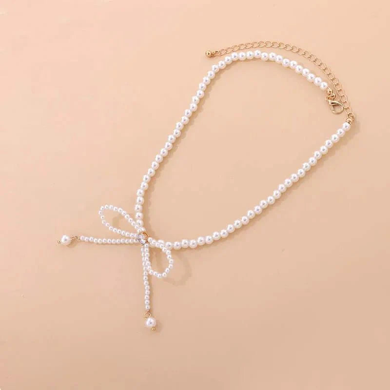 Brehn | Zierliches Perlenband mit Schleife Choker-Halskette