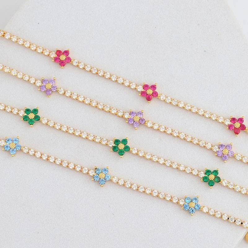 Brehn | Zarte diamantene Blumenarmbänder und Ohrringe