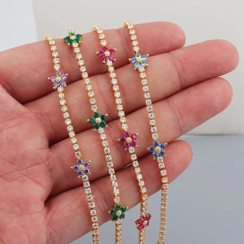 Brehn | Zarte diamantene Blumenarmbänder und Ohrringe