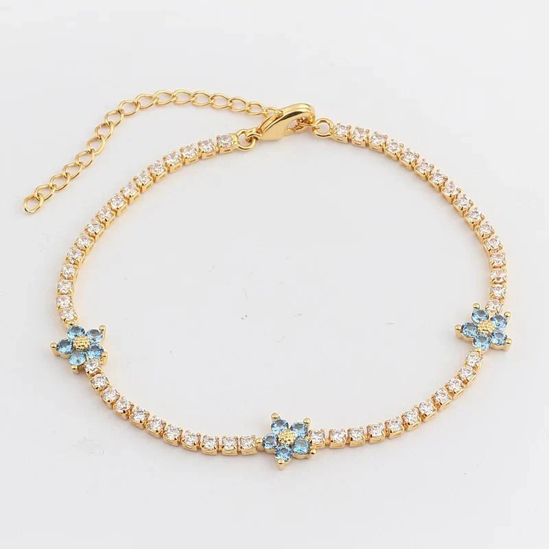 Brehn | Zarte diamantene Blumenarmbänder und Ohrringe